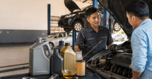 Car engine oil and filter maintenance at an auto service centre – Estremo International